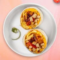 Sausage Space Breakfast Burrito · Sausage, eggs, cheddar cheese, tomatoes and caramelized onions wrapped in a flour tortilla. ...