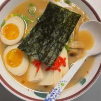 Vegan Ramen · Miso broth, organic tofu, corn, veggie dumplings bean sprouts