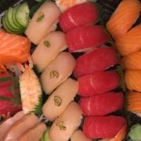 Nigiri & Sashimi  Platter · 20 piece nigiri (salmon & tuna/white fish/yellow tail, shrimp),9 pcs  of sashimi: tuna, salm...