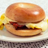 Breakfast Sandwich · Eggs, breakfast meat and cheese with bread.