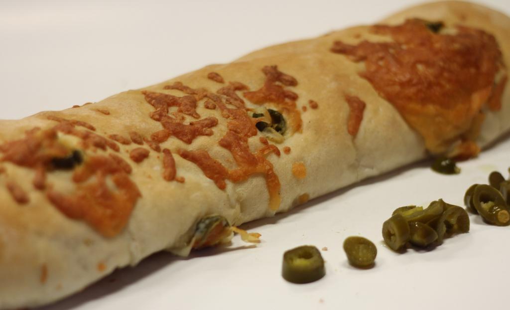 Jalapeno Jack Bread - Daily · The Jalapeno Jack Cheese Bread is piled high with sliced jalapenos and then stuffed with Monterrey Jack cheese. If you like cheese & spice, then this bread is the one you want. Ingredients: Unbleached White Flour, Water, Honey, Jalapenos, Jack Cheese, Yeast, Salt