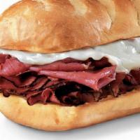 New York Steamer®, Wheat Bread · Corned beef brisket, pastrami, melted provolone, mustard, mayo, and Italian dressing.