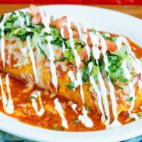 Burrito · All burritos are wrapped in a soft flour tortilla with Mexican rice, beans, and your choice ...
