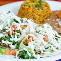 Taco Platter · 3 tacos with your choice of meat served with Mexican rice and beans. All tacos are topped wi...