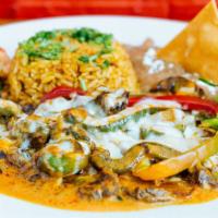 Steak Entrees · Your choice of steak dishes served with Mexican rice, beans, and corn tortillas.