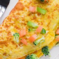 Veggie Omelette · Spinach, Green Pepper, Mushroom, Onion
Choice of your bread or hashbrown