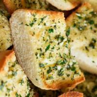 Garlic Bread Galore · Our spin on the traditional garlic bread consists of fresh garlic and butter. Add cheese for...