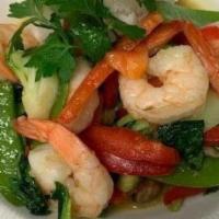 Curry Des Crevettes Aux Légumes Frais (Gluten Free, Available Vegan With Tofu) · Shrimp and fresh vegetables sautéed in a vegan curry sauce; garnished with fresh lime and ci...