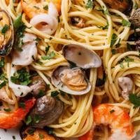 Seafood · Marinade tomato sauce with mussels, scallops and shrimp.