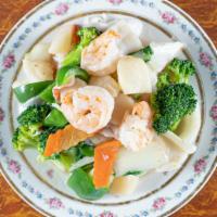 Seafood Delight · Jumbo shrimp, scallops, crab meat, and squid with vegetables.