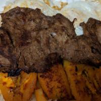 Carne Asada · Grilled 8 oz. steak. Served with potato rice and salad.