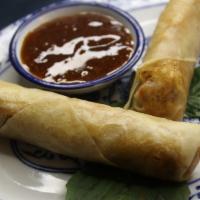 Duck Spring Roll · Five- spiced duck, cabbage, & pickled chili.
