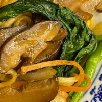 House Wok Noodles · Egg noodles with onion, carrot, & seasonal greens in a soy-ginger sauce. Vegetarian.