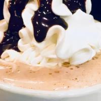 Hot Chocolate  · Rich, dark hot chocolate topped with whipped cream on request.