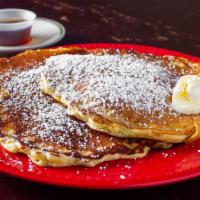 3 Pancakes · Buttermilk deluxe pancakes served with butter and maple syrup.