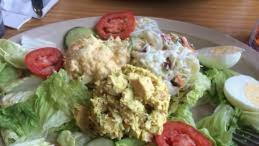 Chicken Salad Platter · with Hard boiled egg, coleslaw, potato salad & garnish.
