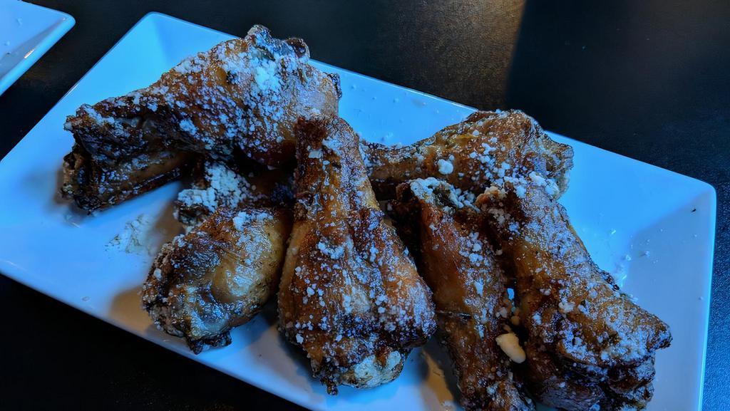 Crispy Chicken Wings · Marinated chicken wings fried to a golden crisp. Plain or your choice of housemade sauce: whisky BBQ, sweet chili, smoked teriyaki BBQ, honey hot, mango habanero or Buffalo.