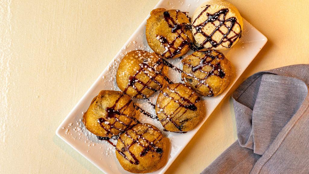 Deep Fried Oreos With Vanilla Ice Cream · Favorite. Oreos, battered in fluffy pancake mix, deep fried to a golden crisp, served alongside a scoop of vanilla ice cream, drizzled with chocolate syrup.