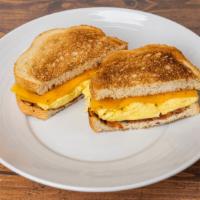 Egg Sandwich · Organic scrambled huevos, Cheddar. Bacon and avocado for an additional charge.