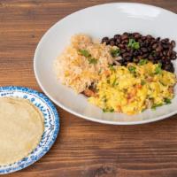 Huevos À La Mexicana · Organic egg scramble with onion, tomato, jalapeño, tortillas, black beans and rice.