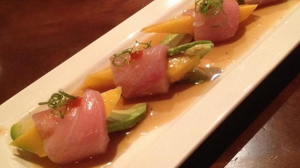 Yellowtail Jalapeno · Hot. Yellowtail with jalapeno hot sauce, ponzu sauce. * 
 
*Consuming raw or undercooked meats, poultry, seafood, shellfish or eggs may increase your risk of foodborne illness, especially if you have certain conditions
