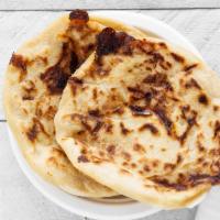 Pupusas · Pork and cheese or beans and cheese.