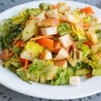 House Salad · romaine & iceberg lettuce, tomatoes, cucumbers, carrots, chickpeas, croutons, red wine vinai...