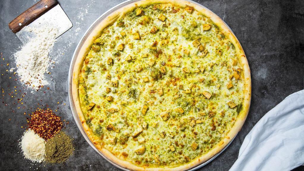 Dressed To Im-Pesto ( Chicken Pesto) · Serves with fresh pesto sauce, and roasted marinated chicken topped with mozzarella cheese blend and cooked until golden brown.