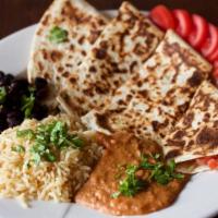 Quesadilla Entrees · Choice of veggie, chicken, steak, or ground beef quesadilla. Served with rice, beans, and sa...