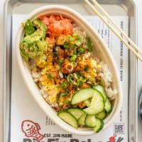 Torched Salmon Bowl · Raw salmon torched with Japanese mayo. Drizzled with big fin shoyu sauce, togarashi chili po...