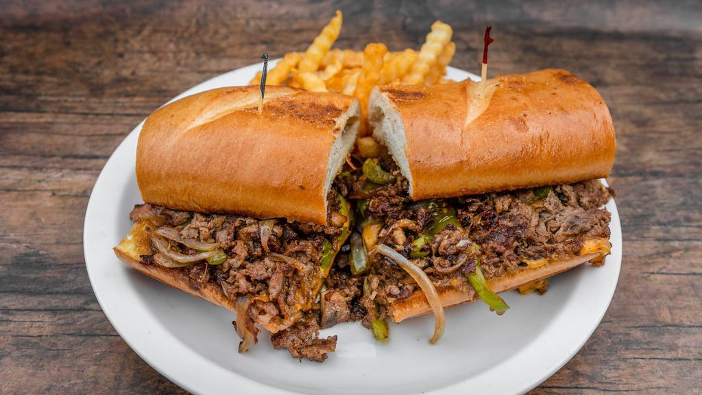 Philly Cheesesteak · Ribeye trimmed and thinly sliced with sweet onions, peppers, mushrooms, cheese, piled on a French roll.