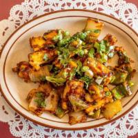 Paneer Chili · Fried homemade cheese chunks and stir-fried vegetables sauteed in a sweet and spicy sauce.