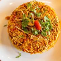 Chicken Biryani (Bone-In) · Chicken cooked with basmati rice and traditional spices, nuts and raisins.