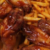 Naked Wings Basket (8) · Choice of BBQ, Cajun, buffalo, and lemon pepper. Served with Cajun fries, fries or sweet pot...