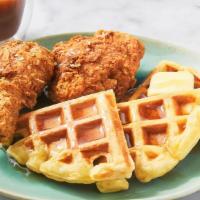 Fried Chicken & Waffles · Crispy Fried Belgium waffle topped with panko crusted chicken breast, choice of BBQ, Das Hot...
