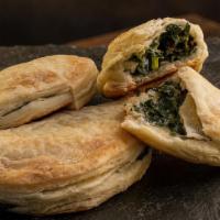 Vegan Empanadas · Potatoes, peppers, onions, peas, carrots, spices in a crispy light dough. Served with dippin...