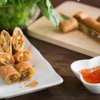 (3) Veggie Spring Rolls (Vegan) · Cabbage, carrots, mushrooms, noodles, and spices in a crispy spring roll served with Vietnam...