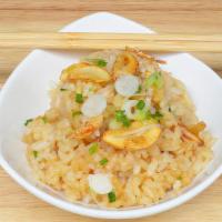 Garlic Fried Rice · Grilled garlic stir fried with rice, sesame and our special seasonings
