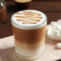 Latte · Double shot espresso topped with hot milk