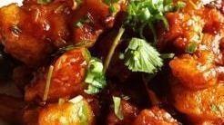 Gobi Manchurian · Fresh cauliflower with cubes of bell pepper, spring onion slightly sautéed and tossed with m...