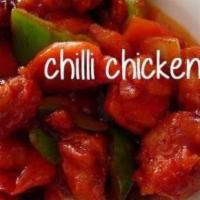 Chili Chicken · Indian or indo-Chinese style. Cubes of chicken breast sautéed with chili paste, soy sauce, o...