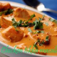 Chicken Tikka Masala · Breast meat chicken skewed in tandoor (clay oven) and sautéed in a tomato and rich creamy sa...