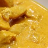 Chicken Shahi Korma · A mughlai delight! Cardamoms flavored sweet and spicy curried chicken in cream, cashews, and...