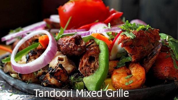 Special Tandoori Mix Grill · Combination platter of tandoori - chicken tikka, chicken seekh kebab, lamb seekh kebab, shrimp, and fish.