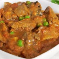 Lamb Curry · Tender pieces of lamb cooked onions, garlic, and ginger in fresh herbs and spices.