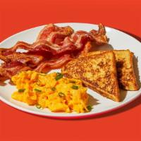 French Toast Platter · Four slices of egg-washed french toast served with two eggs and your choice of breakfast meat.