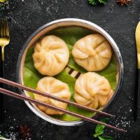 Veggie Steamed Momo · Delightful steamed dumplings filled with finely chopped fresh vegetables
