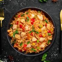 Chicken Fried Rice  · Long grain aromatic rice wok tossed  with chicken and Indo-Chinese sauces