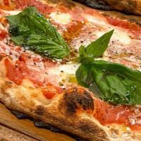 Margherita D.O.P. · San Marzano pomodoro sauce, mozzarella di Bufala, extra virgin olive oil, Grana Padano and f...