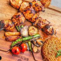 Chicken Kebab · Tender marinated char-grilled chicken cubes with touch of our house spice blend. Served with...